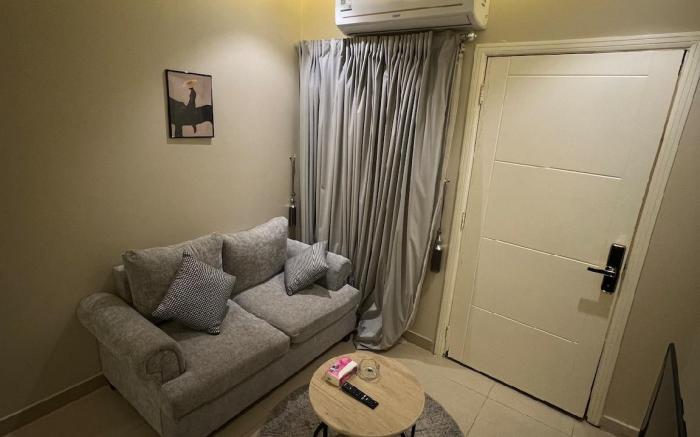 Self check-in studio with a comfortable bed