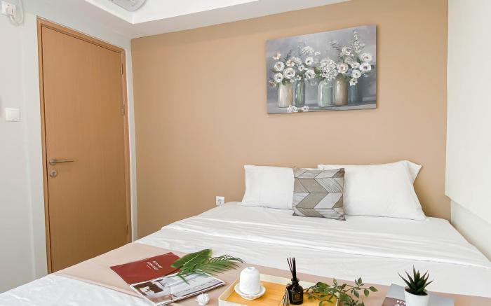 Modern 2BR at Meikarta Apt near AEON By Travelio