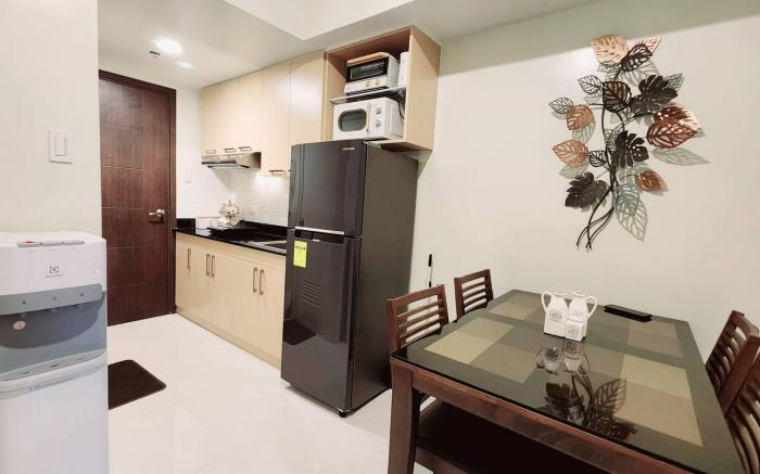 UNIT 305 New Brenthill Condo with balcony near SM BGO