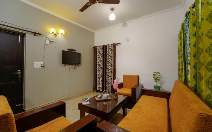 Iva 1 bhk Kainchi Dham : Balcony | Cook | Bonfire