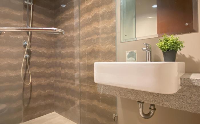 Homey 2BR Apt at Lucky Tower Residence By Travelio