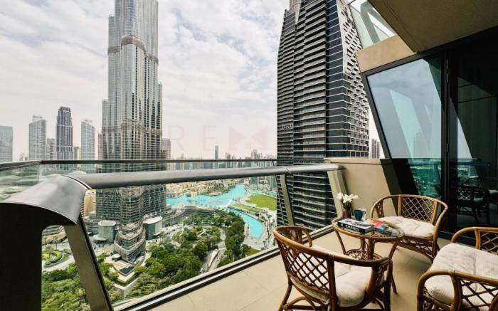 Elegant 4BR High-Rise Overlooking Burj Khalifa & Fountains