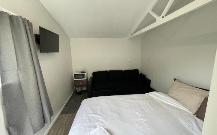 One double and 1 Sofa Beds Garden Chalet