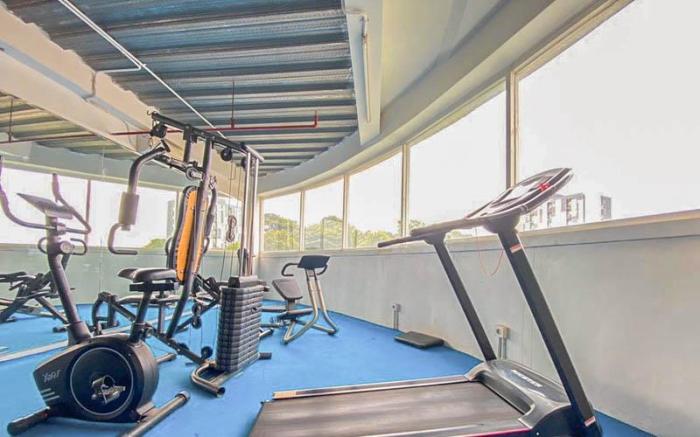 Basic Studio at Candiland Apartment By Travelio