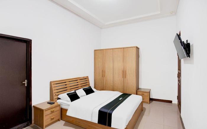 OYO 94775 Palm Cafe Inn