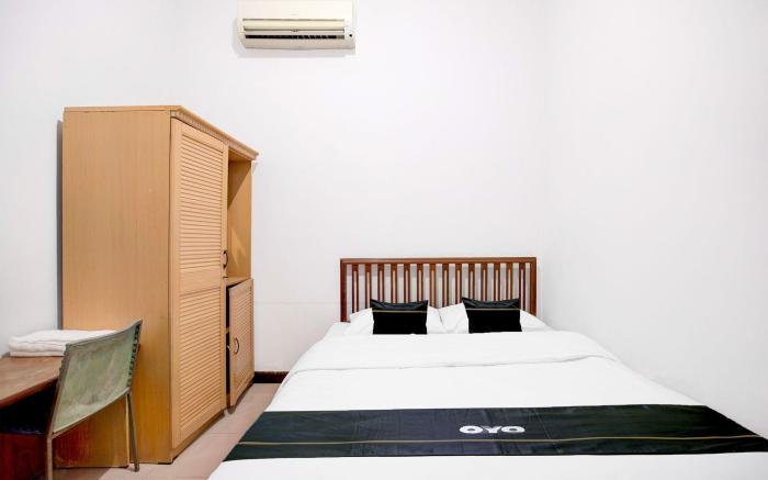 OYO 94775 Palm Cafe Inn