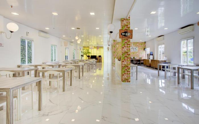 Capital O 94792 Aleander Hotel