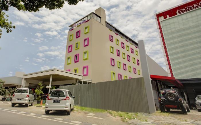 Capital O 94792 Aleander Hotel