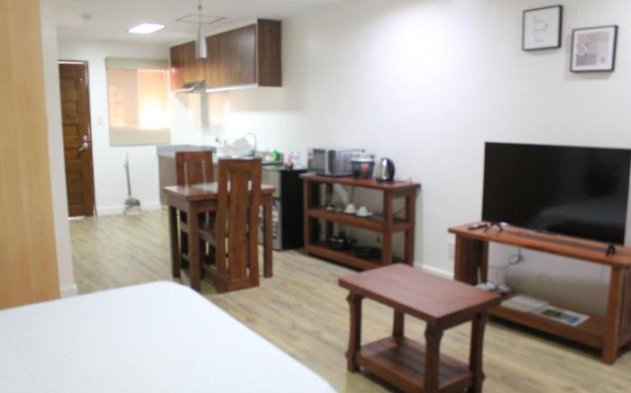 Studio-type condo unit with free Pool Access