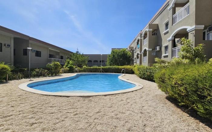 Studio-type condo unit with free Pool Access