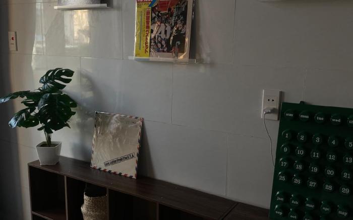 Balcony view room with vinyl record machine.