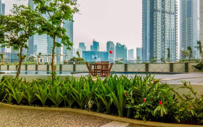 Stunning 2BR at The Wave Kuningan By Travelio