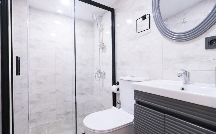 Cozy City Nest with Private Balcony