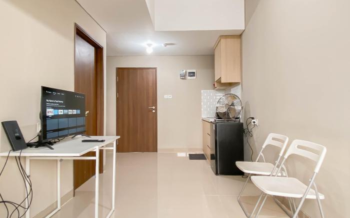 Cream Tone 1BR Royal Sentul Park Apt By Travelio