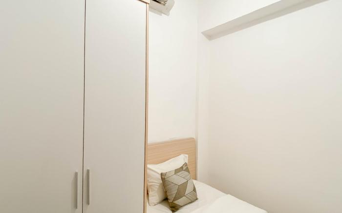 Restful 2BR at Vittoria Residence Apt By Travelio