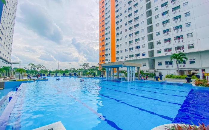 Cozy 2BR Apartment Green Pramuka City By Travelio