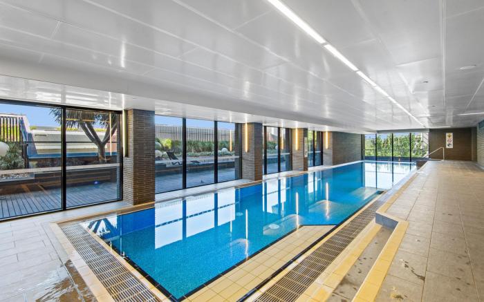 Chic 1-Bed with Balcony Views and Amenities