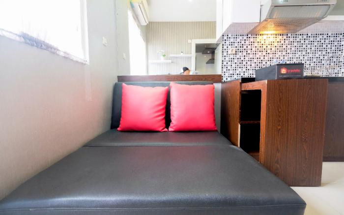 Homey 2BR Green Pramuka Apartment By Travelio