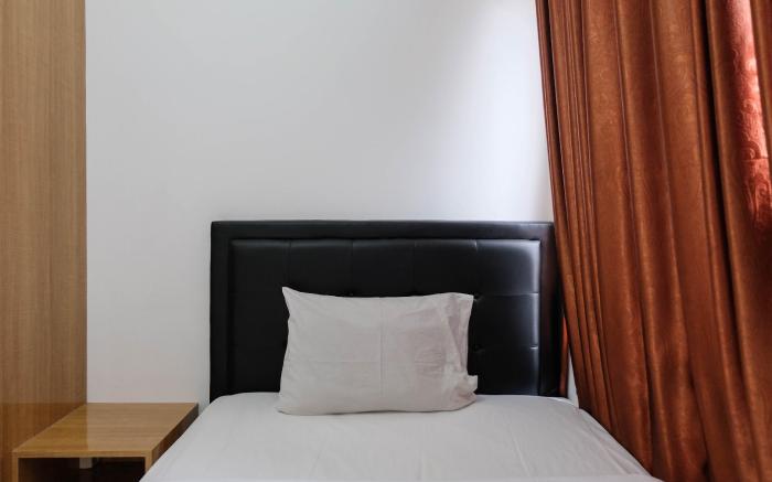 Comfortable 2BR at M-Town Residence By Travelio