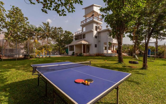 StayVista's Santoni Farms - Riverside Bliss with Pool, Orchard & Activities