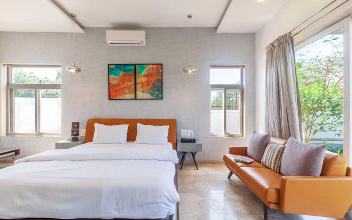 StayVista's White Pebbles with Theater Room