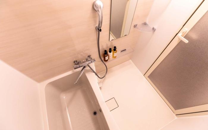 Mr.KINJO in front of Manza Beach