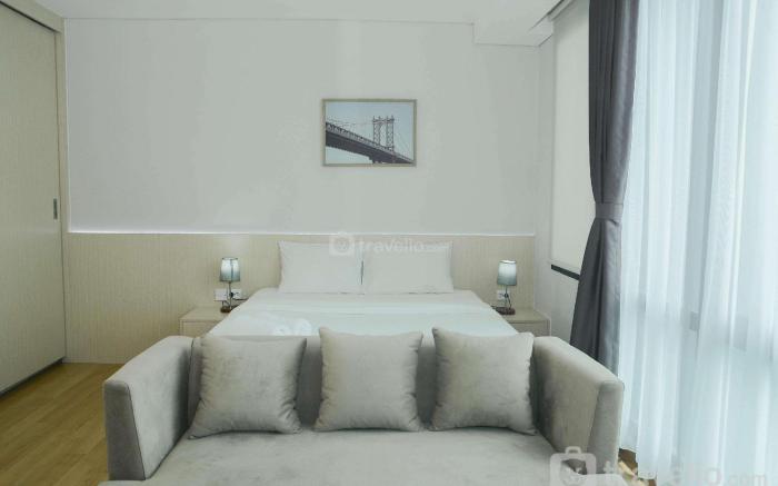 Studio Room @ Capitol Suites Apartment By Travelio