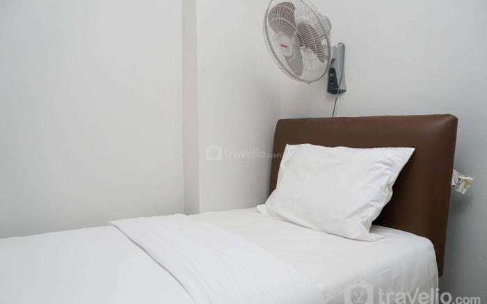 Tranquil Green Pramuka 2BR Apartment By Travelio