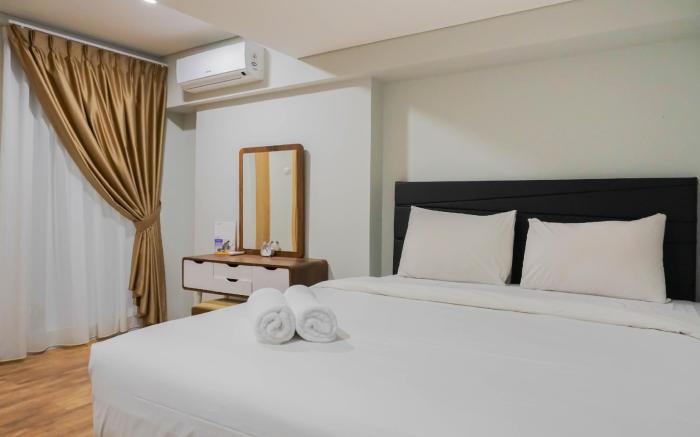Modern 2BR Apartment Maqna Residence By Travelio
