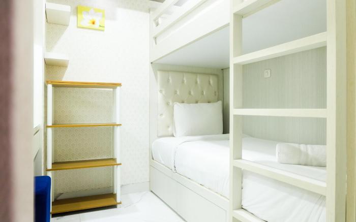 Posh 2BR Apartment at Bassura City By Travelio