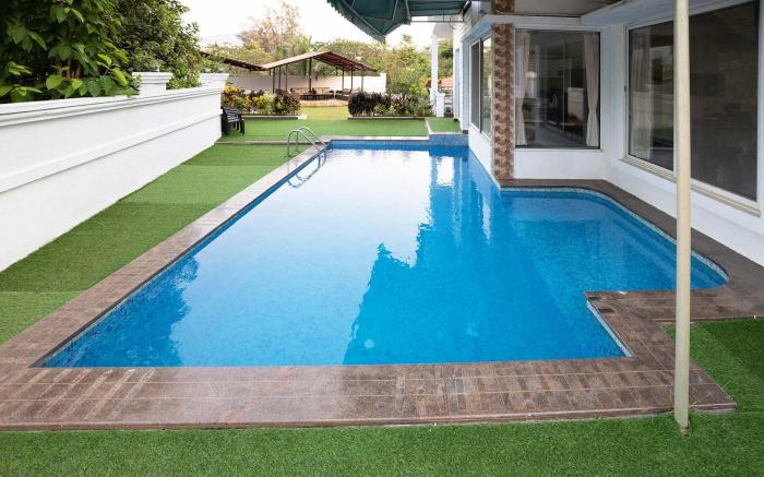 Casa Serenity by StayVista - Relax with a pool, lawn, and inviting jacuzzi