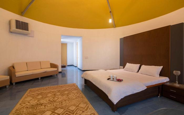 StayVista's Villa Kornet - Mountain-view luxury with a swimming pool and a spacious lawn adorned wit