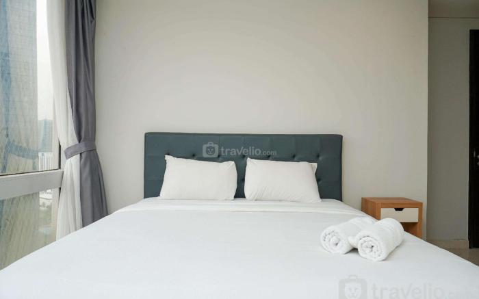 Elegant 2BR at The Empyreal Apartment By Travelio