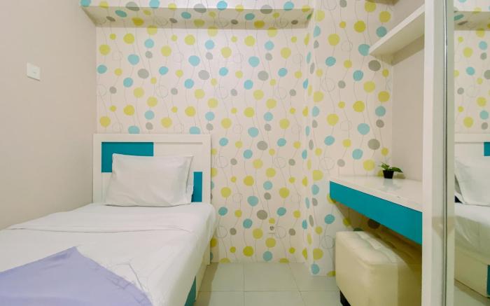 Relaxing 2BR Bassura City Apartment By Travelio