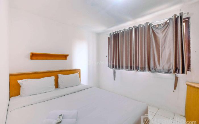 New Furnished 1BR Rajawali Apartment By Travelio