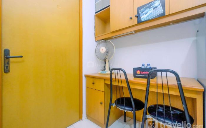 New Furnished 1BR Rajawali Apartment By Travelio