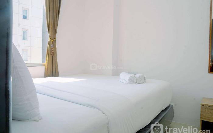 Furnished Minimalist 2BR Bassura City By Travelio
