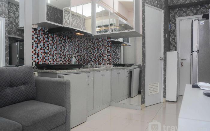 Clean 2BR Green Pramuka Apartment By Travelio