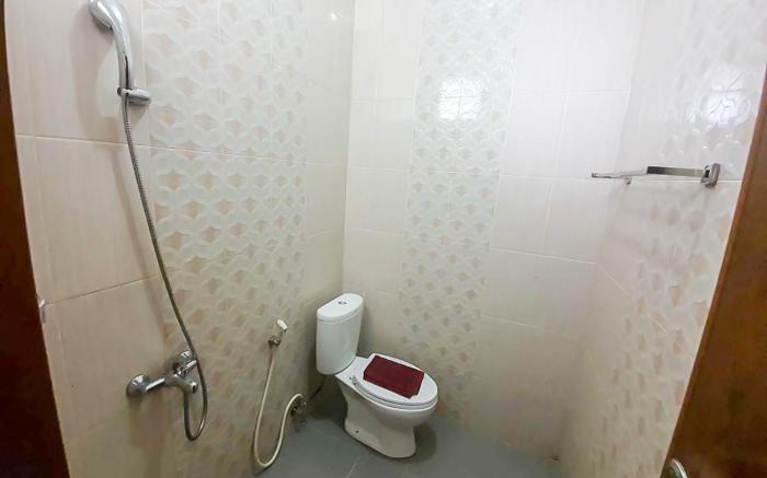 RedDoorz near Jalan Kolonel Haji Burlian Palembang