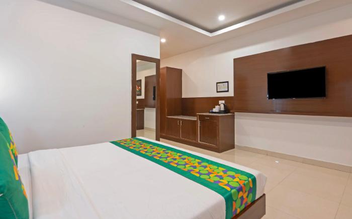 Treebo Grand Legacy Elite With Roof Top Cafe