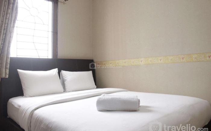 Strategic and Cozy 2BR at Majesty Apt By Travelio