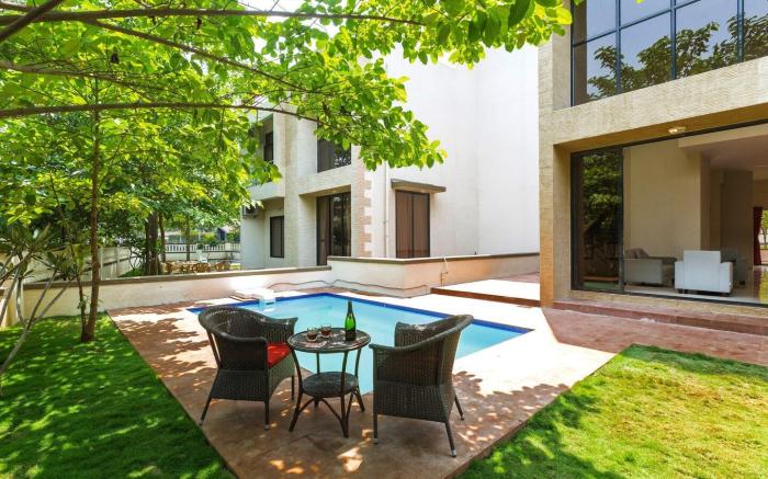 StayVista's Greenwoods Villa 6 - City-Center Villa with Private Pool, Terrace, Lift & Ping-Pong Tabl