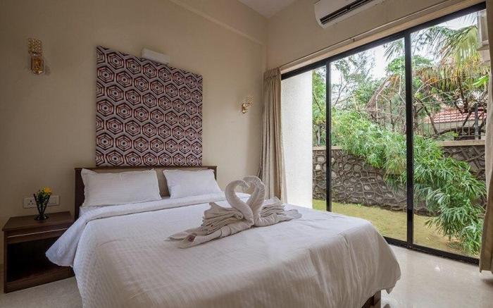 StayVista's Greenwoods Villa 1 - City-Center Villa with Private Pool, Terrace, Lift & Carrom Board