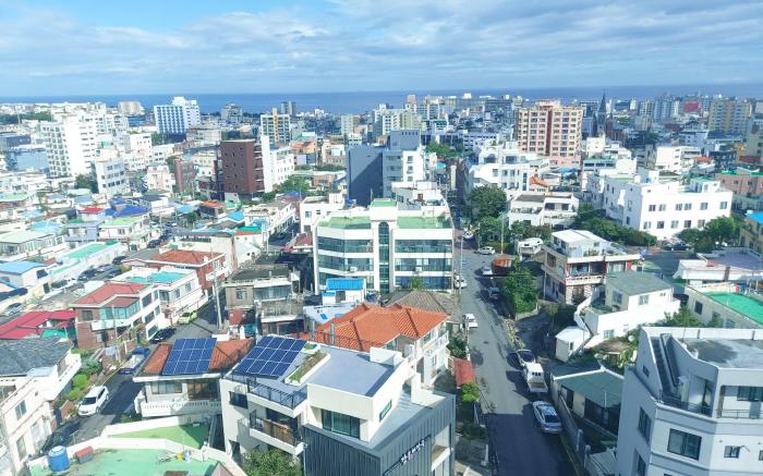 Arapalace No602(2bed)-공항인근,오션시티뷰,동문시장 10분,취사/세탁가능