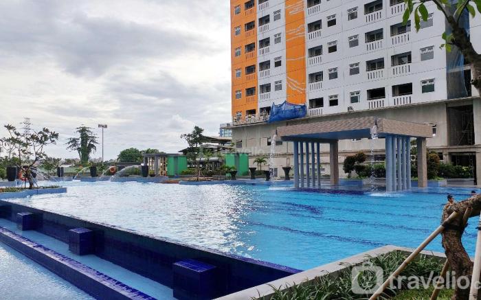 Cozy Stay at 2BR Green Pramuka City By Travelio