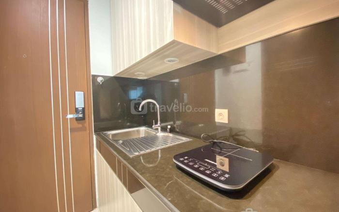Modern Studio Green Kosambi Apartment By Travelio