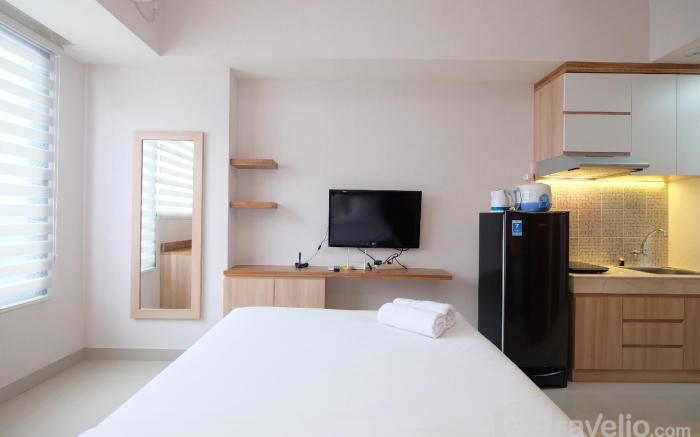 Cozy Studio at Evenciio Apt Margonda By Travelio