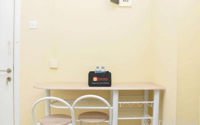Comfort 2BR at Green Pramuka City Apt By Travelio