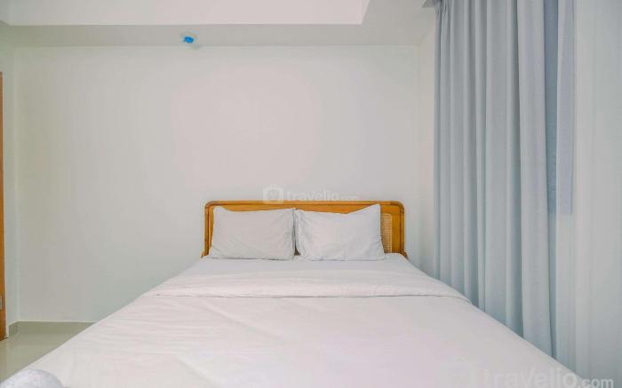 Comfort 1BR at Evenciio Margonda By Travelio
