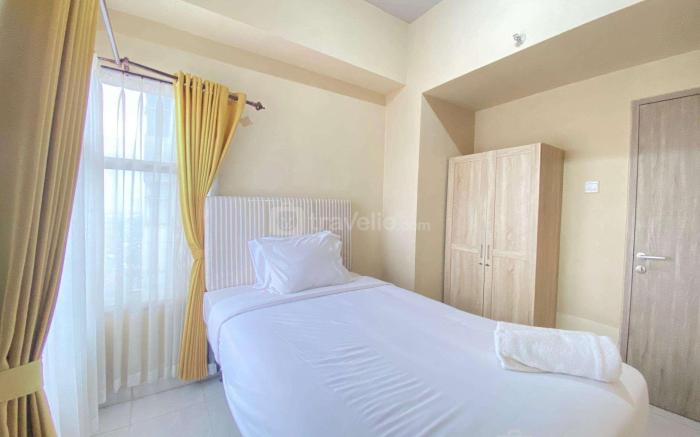 Relaxing 2BR Apt at Newton Residence By Travelio